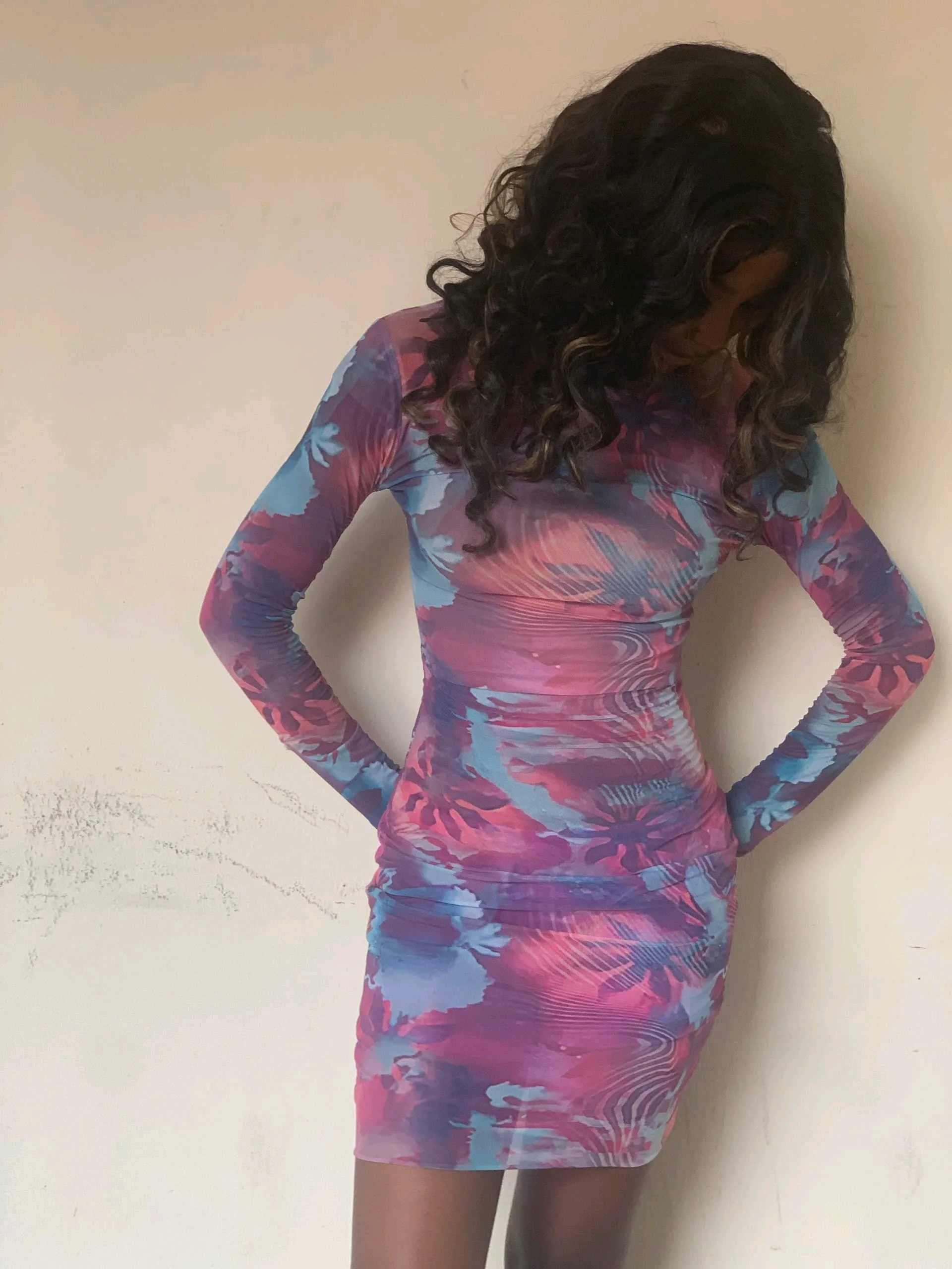 Miss Lola pink and blue printed mesh long sleeve mini dress.