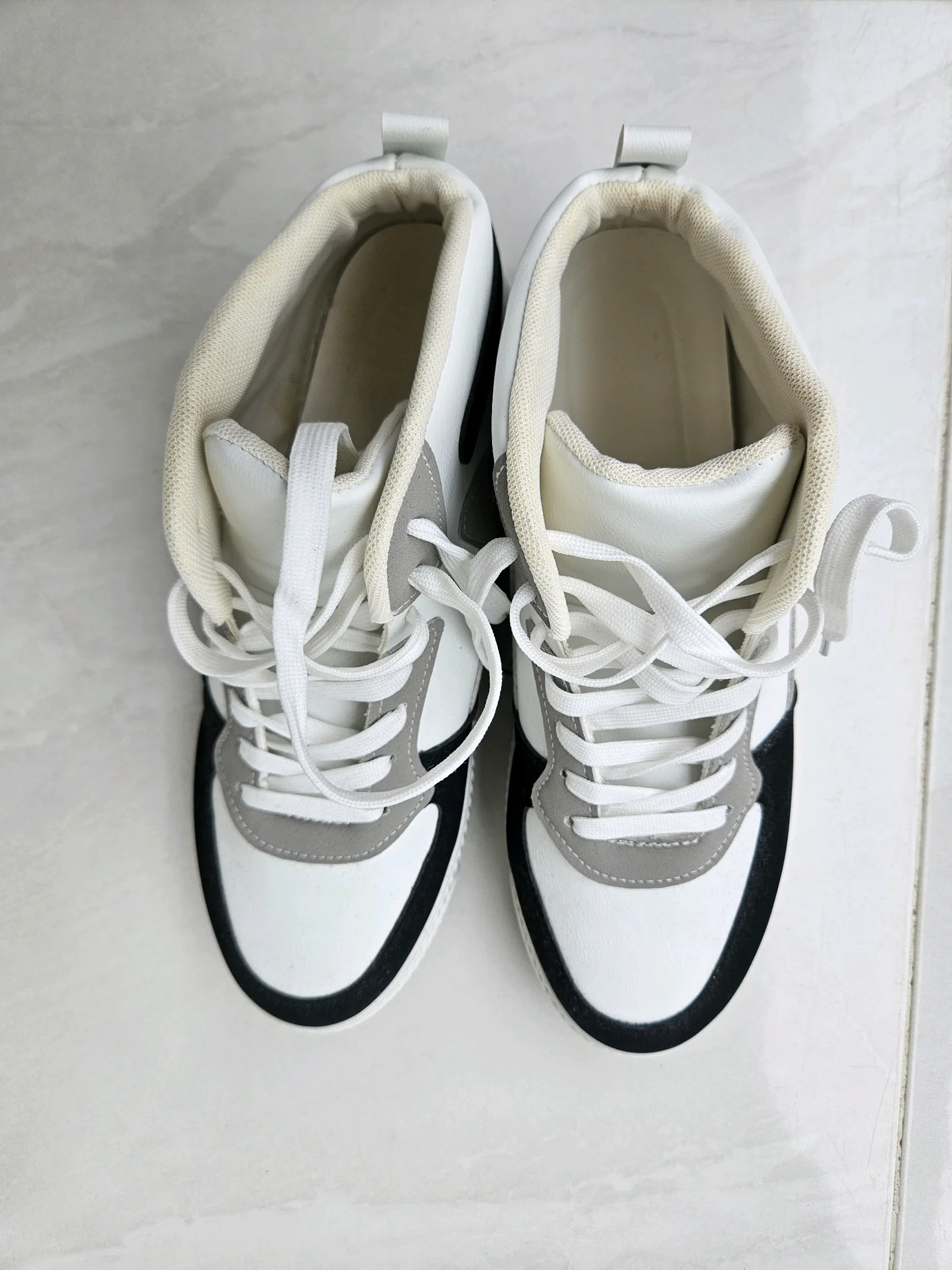 White and Black High-Top Sneakers media 2