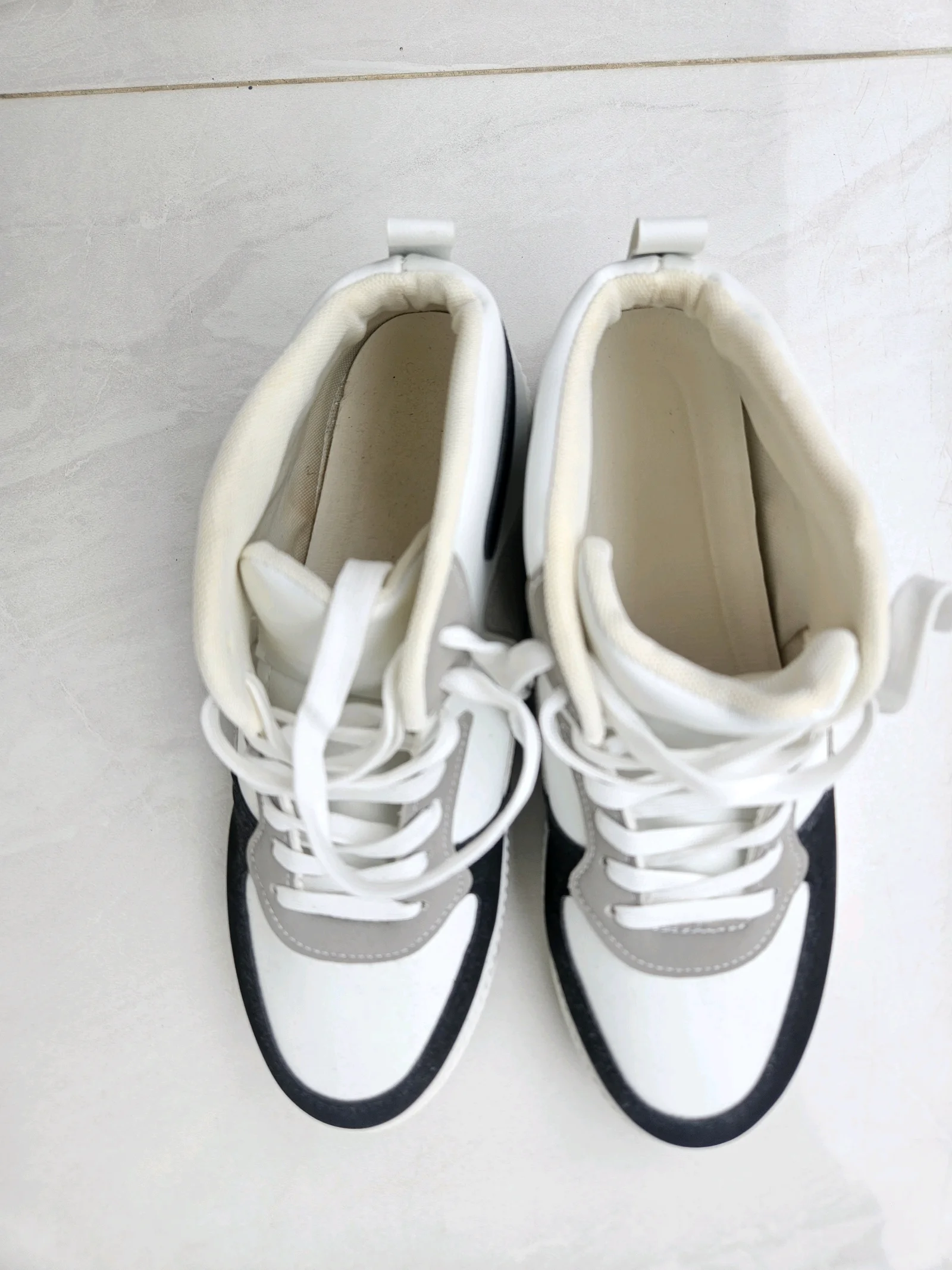 White and Black High-Top Sneakers