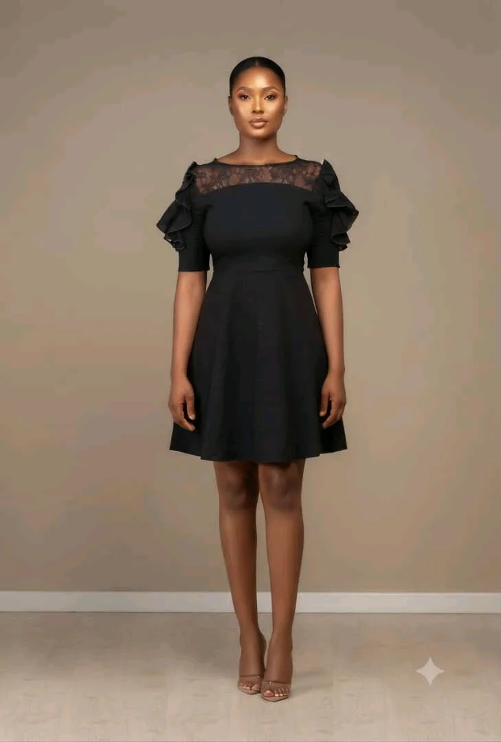 Elegant Black Mini Dress with Lace Detail