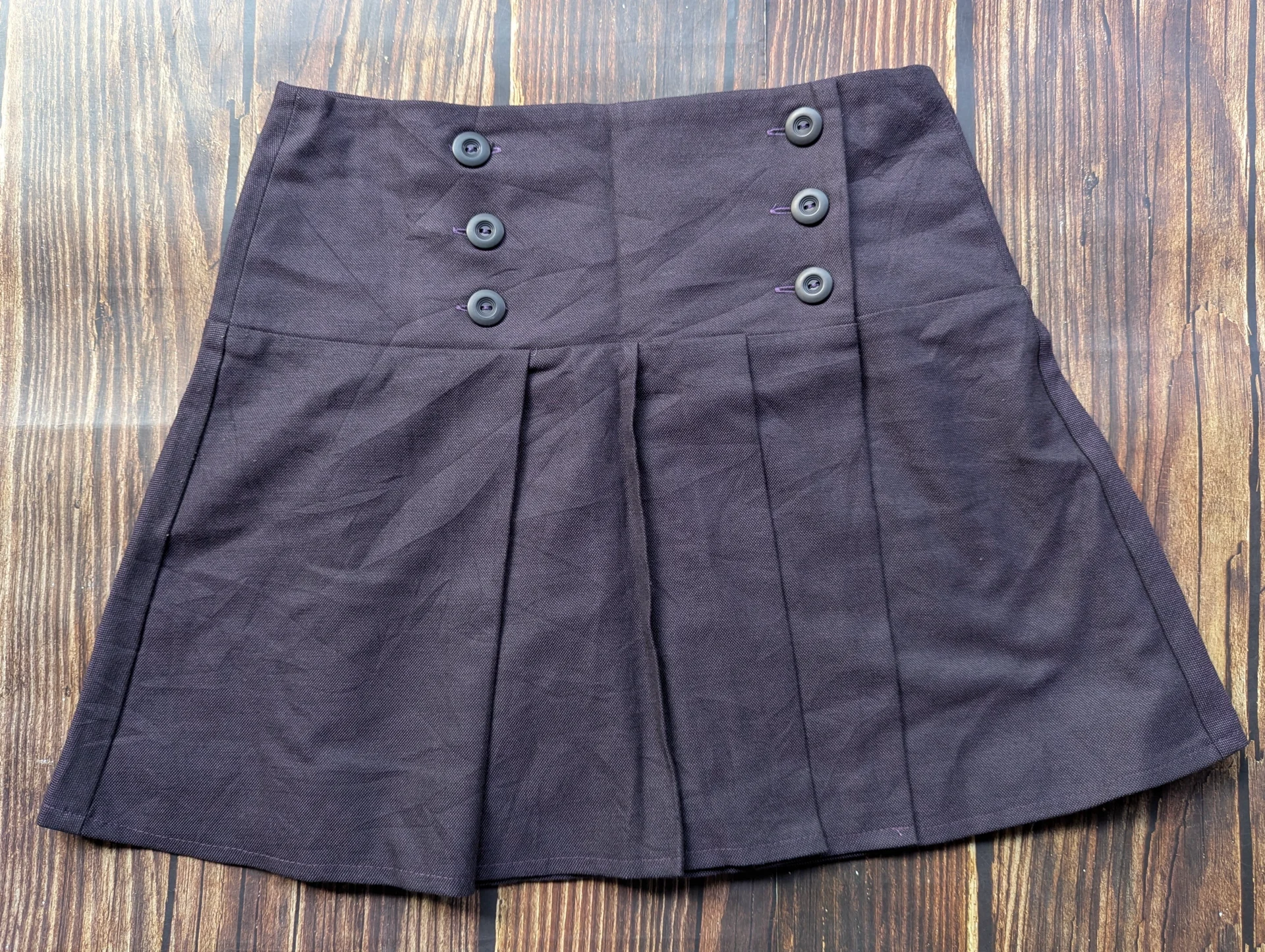 Orsay Pleated Mini Skirt with Button Detail
